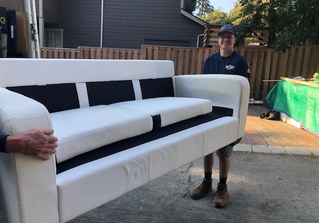 hauling old white couch